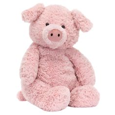 a pink teddy bear sitting up against a white background