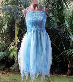 Make your occasion extra-special with one of our magical dresses.  *This beautiful fairy dress is made from taffeta body with three gathered layers of delicate tulle. *The dress has a sheered bodice to fit all sizes from X-small to X-Large. *There are wings attached at the back, which I can remove if not wanted. *To add extra sparkle to the dress, it has scattered sequins sewn over the dress and beads at the hems.  I have a large range of colours to choose from, ranging from delicate pastels to Summer Fairytale Fairy Dress For Dress-up, Sleeveless Fairytale Fairy Dress For Summer, Fairycore Tulle Dress For Party, Summer Fairy Dress For Fancy Dress, Summer Fairy Dress For Fancy Dress Events, Fairytale Fairy Dress For Dress-up In Summer, Fairy Style Dresses With Ruffles For Fancy Dress, Fairy Style Tulle Skirt Dress For Spring, Spring Fairy Style Dress With Tulle Skirt