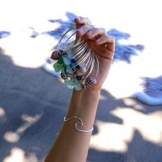 "Thick Silver Wave Bangle~ Love the beach and the surf, then this bangle is just for you! Handmade thick wave bangle hammered and polished to a beautiful shine. *This listing is for a wave bangle made to order in your size, you can also choose to add shells or seaglass* **Made with thick 12 gauge sterling silver wire** Also available in 14k gold fill~ https://www.etsy.com/listing/202163459/wave-bangle-thick-gold-hammered-bracelet?ref=shop_home_active_2 Please view the last picture on this listin Metal Bangle Bracelets For Beach, Nickel-free Bangle Bracelets For Beach, Nickel-free Bangle Bracelet For Beach, Ocean-inspired Silver Bracelets As Gifts, Surfer Girl Jewelry, Ocean-inspired Bangle Jewelry For Gifts, Surfer Girl Gifts, Surf Fashion, Tahitian Pearl Ring