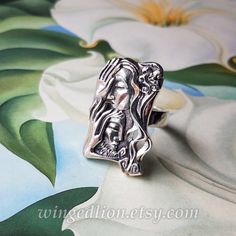 LOVERS ring was inspired by Art Nouveau - one of my favorite art styles. The ring will be made to order in sterling silver in the size specified by the customer. The size of the ring is 1.1" x 0.7" (28x17mm).  The shank is about 4.5mm wide. Please specify your ring size when placing your order. Designed by Natalia Moroz and crafted by Sergey Zhiboedov. © SZ Jewelry Design For the current turnaround time check our shop announcement or contact us. Please check out our "Shop Policies" at www.etsy.c Large Artwork, Colored Gems, Gold Art, Art Styles, Metal Rings, Shop Policies, Rings Statement, Precious Metals, Jewelry Pieces