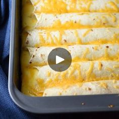 a pan filled with cheese covered quesadillas