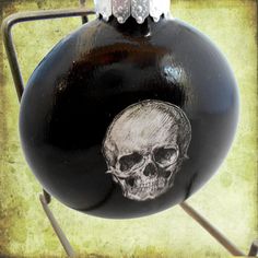 a black bomb with a skull painted on it