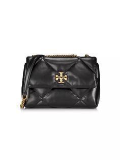 Tory Burch's Kira bag is crafted of luxurious napa leather. Made in Italy, this compact bag features a diamond-quilted design and an adjustable shoulder strap..Adjustable shoulder strap.Interior: one slip pocket and one zip pocket.Magnetic snap closure.Napa leather.Made in Italy.SIZE.About 9'W x 6'H x 3'D.Shoulder strap: about 22' drop.ABOUT THE BRAND.Since debuting her brand in 2004, New York-based designer Tory Burch has made an impact on the fashion world with her handbags and shoes, and playful-yet-polished clothing. Today, Burch remains inspired by color and travel, with her vibrant collections bursting with prints, and her instantly recognizable double-T logo drawing from Moroccan architecture..Tory Burch's Kira bag is crafted of luxurious napa leather. Made in Italy, this compact ba Moroccan Architecture, Tory Burch Kira, Compact Bag, Tory Burch Bags, Tory Burch Bag, Fashion World, Diamond Quilt, Womens Crossbody Bag, Quilted Leather