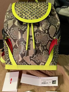 #ad Python Handbags, Playground Games, Red Sole, A Celebrity, Backpack Bag, Online Boutiques, Fashion Designers, Python, In The Dark