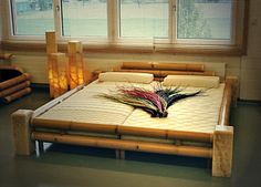 the bed is made up with bamboo sheets