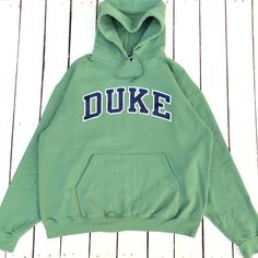 Vintage Duke University Hoodie Duke Crewneck Duke Reverse Weave Sweater Pullover Duke University Blue Devils Embroidery Logo Green XL Label : CHAMPION Label Size : XL  (refer the measurement) Made in HONDURAS Materials from 50% Cotton 50% Polyester Used Item With Condition 7.5/10 Refer Picture. Stain and No Holes. Lay Down Flat Measurement : - Width (armpit to armpit) and: 25Inches - Length (shoulder to end of garment): 27 Inches We are selling used clothing with good condition. DO NOT EXPECT the item is like new condition. Shipping: DHL EXPRESS with TRACKING NUMBER. Track and Trace http://www.dhl.com Parcel will be arrive within 3-6 business days or more due to location and custom clearing. Please PROVIDE your PHONE/CONTACT NUMBER for SHIPPING/DELIVERY purpose. VERY IMPORTANT ‼ for safer University Hoodie, Duke University, Woven Sweater, Blue Devil, University Blue, Sweater Pullover, Used Clothing, Embroidery Logo, Honduras