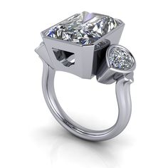 a diamond ring with two diamonds on it