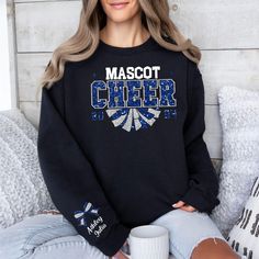 Custom Cheer Sweatshirt, Cheer Faux Glitter Sweater ,Cheer Squad Sweaters, Megaphone Hoodie, Cheer Mom with Name Sweater, Personalized Cheer Perfect gift for friends, family, and all loved ones. Order affordable, high-quality, personalized t-shirts.  Carefully hand-printed using the latest technology printing houses and water-based ink. Thanks for choosing us.  WHAT SIZE FITS ME BEST  Please scroll through the photos. Measurements for clothing types and sizes are listed as well.  These are a unisex fit; they will be looser if you order your normal women's size.  Size chart measurements are not circumference.  Clothing brands may vary depending on stock status.  EASIEST WAY TO ORDER  1. Please read all pertinent information and scroll through all the photos. 2. Pick your clothing style and Long Sleeve Sweatshirt For Winter Fan Gear, Team Spirit Long Sleeve Winter Sweatshirt, Winter School Spirit Long Sleeve Hoodie, Winter School Spirit Long Sleeve Sweater, Winter School Spirit Hoodie, Winter Hoodie With School Spirit Long Sleeve, Winter Long Sleeve Sweater For School Spirit, Team Spirit Winter Sweater, Team Spirit Winter Sweater With Long Sleeves