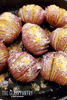 baked apples are covered in powdered sugar and sprinkled with seasoning on top