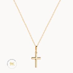 This 9k Gold Cross Necklace includes a beautifully delicate fine gold chain and a cross pendant crafted out of 9k solid gold. Pair with a personalized engraved necklace or simply wear it alone for a statement look.9K Fine GoldCross charm size: Length 12mm, Width 8 mm, Thickness: 0.8 mmSecure clasp fasteningCharms are removable from this chainHand engraved in our Paris workshopSent with love in a complimentary gift boxAny slight variations in lettering depth, spacing and alignment from the exampl Yellow Gold Charm Necklace With Cross Pendant, Yellow Gold Cross Charm Necklace With Delicate Chain, Yellow Gold Cross Pendant Charm Necklace With Delicate Chain, Yellow Gold Cross Charm Necklace Tarnish Resistant, Delicate Yellow Gold Cross Charm Necklace, 14k Yellow Gold Cross Pendant Charm Necklace, Yellow Gold Tarnish-resistant Cross Charm Necklace, Dainty 14k Yellow Gold Cross Necklace, 14k Gold Cross Pendant Necklace For First Communion