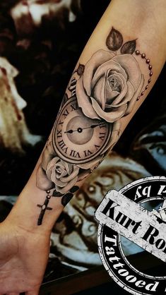 a person with a tattoo on their arm holding a clock and rose in the middle