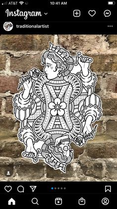 an intricately designed sticker on the side of a brick wall