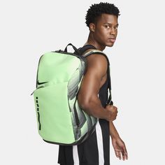 You're a hooper, and you need the bag to match. A spacious main compartment helps store your gear, while zippered pockets provide quick access to your small essentials. Our favorite part? Air units on the shoulder straps help keep you fresh for the next pickup game. Nike Hoops Elite Pro Backpack, Elite Bags Nike, Nike Functional Backpack With Zipper Closure, Nike Elite Bag, Elite Nike Backpacks, Nike Backpack With Zipper Closure, Nike Elite Backpack, Elite Backpack, Printed Backpack