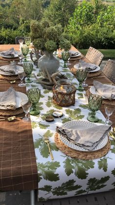 We are obsessed with this green and brown Tablescape utilizing our Fall Holiday Tablecloth, Oakleaf Runner, Green Goblets, Water Hyacinth Placemats, Ecru Napkins and Wicker Hurricanes. It’s fresh and will take you thru fall with a effortless elegance that’s easy and quick to set up. Brown Tablescape, Eating Table, Green Tablecloth, Holiday Tablecloths, Dinner Table Setting