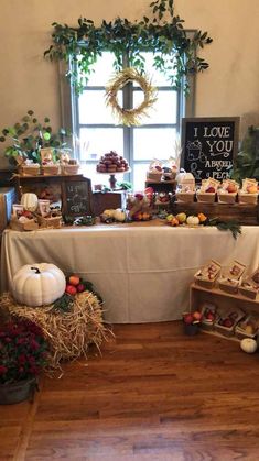 a table covered with lots of food and decorations