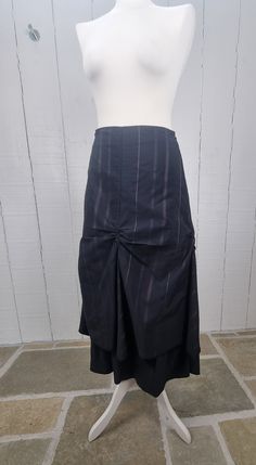 1990's long skirt, black with purple stripes. Camaïeu skirt. Washed and ready to wear. Cotton mix. Size: 36 E.U Waist / hips: 34 cm Length: 84 cm Striped Fitted Long Skirt, Striped Fitted Midi Skirt, Black Asymmetrical Gathered Maxi Skirt, High-waist Black Gathered Maxi Skirt, Fitted Black Tiered Maxi Skirt, Dark Purple Skirt, Stripes Skirt, Black Striped Skirt, Purple Skirt