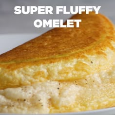 a piece of food on a plate with the words super fluffy omelet