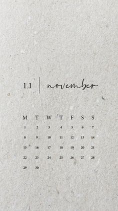 a calendar with the word november written in cursive writing on it's side