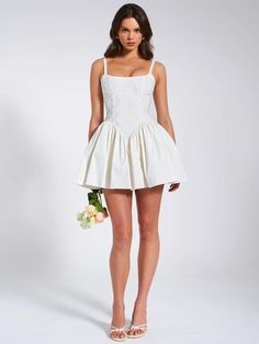 Introducing the alluring Kadi White Cotton Corset Mini Dress, a delightful addition to your wardrobe. Crafted from crisp low stretch Cotton Poplin, this mini dress exudes casual elegance. Delicate lace detailing adorns the garment, adding a touch of charm. The V-shaped waistline and the built-in bones accentuates your figure, while the lace-up back and adjustable stripes ensures a perfect fit. With invisible pockets and mesh bustle inside seamlessly integrated into the design, this dress offers Miss Circle, Satin Corset Dress, Cotton Corset, Waist Corset, Loungewear Dresses, Circle Dress, Corset Mini Dress, Event Outfit, Satin Gown