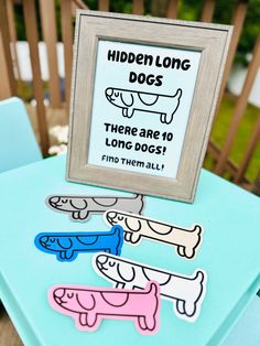 a sign that says hidden long dogs there are 10 lonic dogs find them all