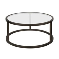 a round glass table with metal frame