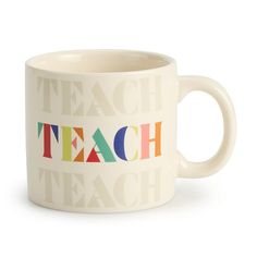 a white coffee mug with the words teach on it's front and back sides