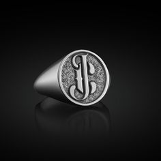 Personalized Signet Monogram Ring in Sterling Silver, Engraved Signet Mens Ring, Stackable Ring, Gift for Mom, Gift for Her, Pinky Ring This 925K Sterling Silver Personalized Signet Monogram Ring's photos are taken with original and every item is a handmade. It's very elegant and classy for everyday use and gives stylish look to your outfits. It also makes a great gift for him/her or your best friend. All details have been considered to make it the most meaningful and eye-catching gift.  As SilverByRevlis Team, we work for the pleasure of you and your loved ones. ✦ Item Details ✦ * Gender: Male/ Female * Stamp: 925 Sterling Silver * Finish: Oxidized * Ring Weight: 12-13 gr.(THE WEIGHT MAY CHANGE ACCORDING TO RING SIZES ) * Ring Size: 11 US (FOR IN THIS PICTURE) * All our products are handm Luxury Silver Jewelry With Engraved Logo, Classic Anniversary Jewelry With Engraved Logo, Classic Ring With Engraved Logo, Classic Jewelry Ring With Engraved Logo, Classic Engraved Logo Ring, Classic Engraved Ring With Logo, Classic Silver Engraved Logo Ring, Luxury Engraved Logo Jewelry For Gift, Silver Jewelry With Engraved Logo