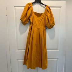 Never Worn. It’s Just Been Hanging In My Closet For Over A Year. Small Seam Loosening Around Waist Area. Super Easy Fix And Not That Noticeable. Small Flaw On Neck Area. Ptp: 19” Waist 16” Yellow Pleated A-line Midi Dress, Fitted Yellow Pleated Midi Dress, Yellow Puff Sleeve Dress For Summer, Yellow Puff Sleeve Cotton Dress, Yellow Cotton Puff Sleeve Dress, Yellow Puff Sleeve Dress For Spring, Yellow Cotton A-line Midi Dress, Yellow Pleated Short Sleeve Dress, Yellow Ruched Dress With Short Sleeves