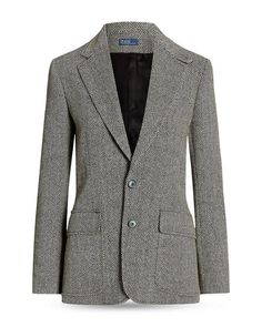 Elevate your wardrobe with the timeless sophistication of our Herringbone Blazer. Crafted with meticulous attention to detail, this blazer features notch lapels, a two-button front closure, and long sleeves with four-button cuffs for a classic, polished look. The distinct herringbone pattern adds a touch of modern flair, while the suede collar facing and shoulder pads provide a luxurious and structured feel. With flap hip pockets and a vent at the center back hem, this blazer seamlessly combines style and functionality. Whether you're headed to a business meeting or a special event, this blazer is the perfect choice for making a lasting impression. Designed and made in Portugal, the impeccable craftsmanship and quality construction ensure a standout addition to your wardrobe. Fully lined f Formal Tweed Blazer With Herringbone Pattern, Classic Tweed Jacket With Herringbone Pattern, Tailored Sport Coat With Herringbone Pattern And Lapel Collar, Classic Office Tweed Jacket With Herringbone Pattern, Classic Formal Tweed Jacket With Herringbone Pattern, Ralph Lauren Formal Blazer With Suit Collar, Tailored Herringbone Outerwear For Formal Occasions, Elegant Tweed Sport Coat With Lapel Collar, Formal Herringbone Blazer For Fall