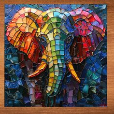 an elephant made out of stained glass is shown