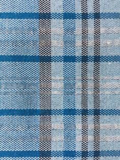 blue and white plaid fabric close up