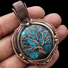 Turquoise Pendant Tree Of Life Pendant Handmade Pendant Copper Wire Wrapped Pendant Unique Jewelry Wire Wrapped Jewelry Turquoise Jewelry Main Stone -   Turquoise  Pendant Length - 7.00 CM Pendant Width  -  5.00 CM Metal                  -  Copper Copper Has Been Used For Jewelry Making For Thousands Of Years, Dating Back To Ancient Civilizations Such As The Egyptians, Romans, And Aztecs. Copper Was Valued For Its Beauty, Versatility, And Durability, And Was Often Used To Make Everything From Je Bohemian Blue Turquoise Necklace With Patina, Handmade Turquoise Necklace With Copper, Handmade Copper Turquoise Necklace, Handmade Turquoise Copper Necklace, Handmade Turquoise Necklace Nature-inspired, Handmade Nature-inspired Turquoise Necklace, Handmade Turquoise Necklace, Nature-inspired, Turquoise Pendant Necklace Wire Wrapped, Bohemian Wire Wrapped Turquoise Pendant Necklace