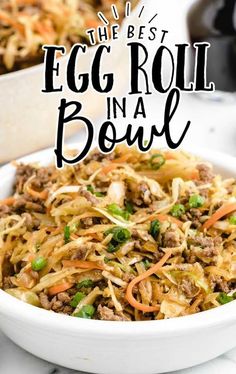 egg roll in a bowl with carrots and green onions