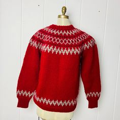 "A warm, chunky-knit pullover style sweater with a lovely geometric pattern around the yoke. A simpler version of the pattern repeats on the sleeves and hem. This sweater was worked bottom-up in the round to the underarm, the sleeves were worked separately, and then all parts were joined together on one needle to the yoke and neck opening. Likely a Mens Large, but please see details below. The measurements are taken while the sweater is laying flat. Measures:  20\" (50 cm) across shoulders (roughly, as the shoulders slope)  23\" (57.5 cm) across chest 29\" (72.5 cm) from front neck to hem 22\" (55 cm) from underarm to end of sleeve 40\" (100 cm) around at bottom hem" Sweater Gift, Style Sweater, Pullover Sweater Women, Knit Pullover, Wool Sweater, Black Pattern, Women Pullover, Knitted Pullover, Wool Sweaters