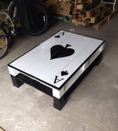 a coffee table made out of playing cards