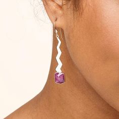 Jay King Sterling Silver Ruby Wavy Drop Earrings Add a touch of fun fashion to your jewelry collection with these handcrafted sterling silver earrings. The artistic, dangling drops feature faceted Indian rubies topped with a wavy, silver cut-out.       Approx. 2-5/16"L x 3/8"W     Stamped .925     Pierced with wire backs     Sterling silver earrings each have checkerboard-faceted, hexagon-shaped ruby bezel-set at base of wavy, zig-zag silver piece   Stone Information       All sizes and weights Faceted Sterling Silver Earrings For Party, Faceted Sterling Silver Jewelry For Party, Faceted Sterling Silver Party Jewelry, Ruby Top, Jewelry King, Color Bands, Red Ruby, Fun Fashion, Hexagon Shape