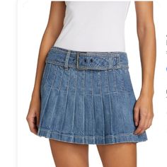 Alice + Olivia Mera Denim Pleated Mini Skirt With Buckle Alice + Olivia "Mera" Denim Pleated Skirt With An Adjustable Buckle. Size Info True To Size. 24=00, 25=0, 26=2, 27=4, 28=6, 29=8, 30=10, 31=12, 32=14. Low Waist Mini Length Fit And Flare Silhouette Back Zip Polyester/Acrylic Dry Clean Imported Denim Pleated Mini Skirt, Skirt With Buckle, Denim Pleated Skirt, Pleated Mini Skirt, Low Waist, Alice Olivia, Pleated Skirt, Fit And Flare, Mini Skirt