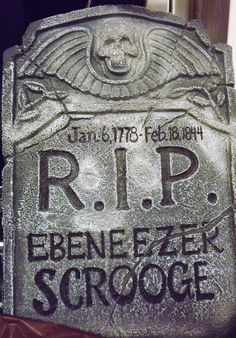 a tombstone with the words rip written on it