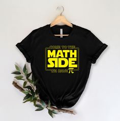 some to the math side we have pi t - shirt on a wooden hanger