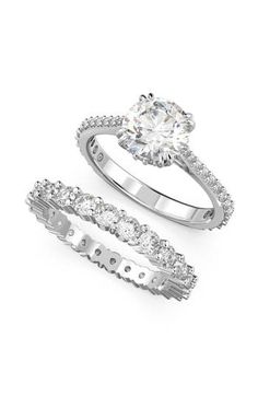 Stack some sparkle or keep it simple with a pair of Swarovski crystal rings that look luscious worn together or separately. 1/4"W x 1/4"L setting; 1/4" stackable width Swarovski crystal/rhodium plate Imported Swarovski Promise Ring, Swarovski Engagement Ring, Swarovski Ring Engagement, Prom Rings, Winter Cruise, Xoxo Jewelry, Rings Sets, Silver Wedding Ring, Stacked Wedding Rings