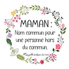 a quote written in french with flowers and leaves around it that says,'mama '