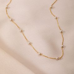 Multiple Pearls Necklace 14k Solid Gold, Dainty Every Day Fresh Water Pearls Necklace, Perfect Beach Jewelry, Gift For Bridesmaids Material: Solid Gold (Not Gold Filled or Gold Plated) Karat: 14 K Gold (585) (Real Gold) Available gold color: Yellow (gold), rose, white The number of pearls may vary depending on the necklace's length. Chain thickness: About 0.72mm  M o r e * F r o m * U s  Goldstore Jewelry - https://etsy.me/3gHtcrZ * Editor's Pick - https://etsy.me/3CCLlmm * Cremation Urn Jewelry - https://etsy.me/3MM0Lcq * Birthstone Jewelry - https://etsy.me/3w5fHwu * Birth Flower & Zodiac - https://etsy.me/3t1Exvo * Evil Eye Jewelry - https://etsy.me/3vWYfKJ * Necklace Personalized - https://etsy.me/3hZOYt1 * Cross Jewelry - https://etsy.me/3CDKYYF * Mama Jewelry - https://etsy.me/3pVglc Tarnish Resistant White Gold Necklace For Wedding, Yellow Gold Single Strand Necklace For Wedding, Dainty Yellow Gold Station Necklace For Anniversary, Dainty White Gold Station Necklace As Gift, Dainty White Gold Station Necklace For Anniversary, Gold Station Necklace For Anniversary, Gold Station Necklace With Delicate Chain For Anniversary, Elegant White Station Necklace As A Gift, Elegant White Station Necklace Perfect For Gift