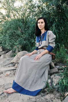 This early medieval linen dress is universal for the Vikings and Slavs or any others reenactors. Based on medieval iconography and archaeological finds from Europe. The dress has 2 wedges on both sides and tapered sleeves. It's loose and comfortable. Made from 100% natural linen, soft and breathable, perfect for summer days, or as lingerie under a woollen dress for cooler weather. It is decorated at the neckline and on the cuffs by the decorative hems (made of linen). Invisible stitches are made Medieval Long Sleeve Linen Dresses, Peasant Dresses For Medieval Festivals, Fitted Linen Dresses For Larp, Bohemian Linen Medieval Dress For Larp, Cotton Dresses For Larp, Bohemian Dresses For Larp, Peasant Dresses For Larp, Medieval Long Sleeve Linen Dress For Larp, Peasant Style Medieval Linen Dress For Larp