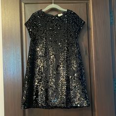 Gorgeous Zara Black Sequin Dress. Perfect For The Holidays!Brand New, Size 7 With Tags! Selling A Few Of My Daughters Items (She Had A Growth Spurt) Be Sure To Check Out The Other Listings. Short Sleeve Holiday Dresses For Dress-up, Elegant Zara Sequin Dress For Party, Fitted Zara Dress For Holiday, Fitted Sequin Short Sleeve Dress For Dress-up, Fitted Black Dress For Holiday, Sequin Short Sleeve Dress For Dress-up, Sequin Dress Zara, Glamorous Zara Sequin Cocktail Dress, Glamorous Zara Sequin Dress