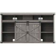 an entertainment center with sliding doors on the front and side panels, in grey wood