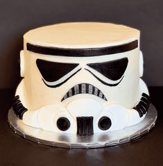 a star wars themed cake with white frosting