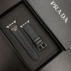 Premium Leather Construction: The Prada Apple Watch replacement strap is made from high-quality leather, ensuring a luxurious feel and long-lasting durability. The leather offers a sophisticated and stylish upgrade to your Apple Watch. Iconic Triangle Monogram Logo: Adorned with Prada's signature triangle monogram logo, the strap showcases the brand's distinctive design and prestigious heritage, adding a touch of elegance to your wrist. Sleek and Elegant Design: The strap features a sleek des... Luxury Leather Strap Watch Bands For Business, Luxury Black Adjustable Apple Watch Band, Luxury Leather Watch Bands, Luxury Black Rectangular Watch Accessories, Business Leather Apple Watch Band In Black, Luxury Black Watch Bands With Bracelet Strap, Business Black Leather Apple Watch Band, Luxury Black Leather Strap Watch Bands, Luxury Leather Strap Apple Watch Band For Business