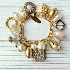 Best-selling vintage-inspired charm bracelet filled with a bold and beautiful collection of brass charms and pearls that give it a rich and elegant timeless style. Meet your new favorite go-to bracelet when you want a powerful finishing touch to any outfit. 8" L with lobster clasp Made in the USA