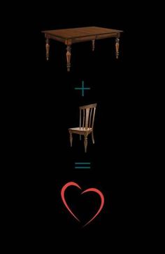 two chairs and a table in the middle of a dark room with a heart on it