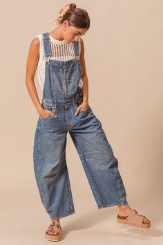 Washed Denim Slochy Pants Overalls Jumpsuit 100% Cotton Barrel Leg Overalls Outfit, Medium Wash Relaxed Fit Denim Jumpsuit With Bib Front, Utility Denim Bib Front Bottoms, Utility Denim Bottoms With Bib Front, Dark Wash Wide Leg Cotton Overalls, High Rise Denim Jumpsuit With Pockets In Utility Style, Utility High Rise Medium Wash Overalls, Utility Style High Rise Medium Wash Overalls, Denim Blue Casual Overalls